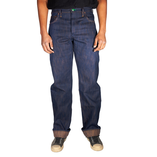 Person wearing dark blue jeans on a white background