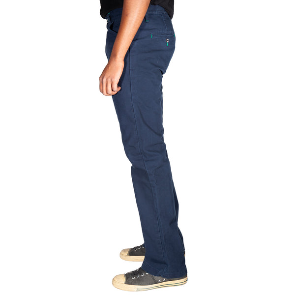 Person wearing navy blue pants on a white background