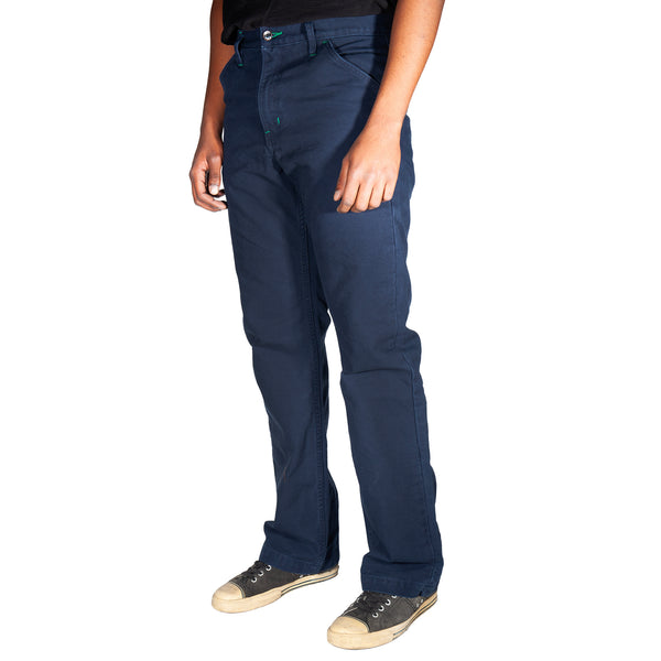 Person wearing navy blue pants on a white background
