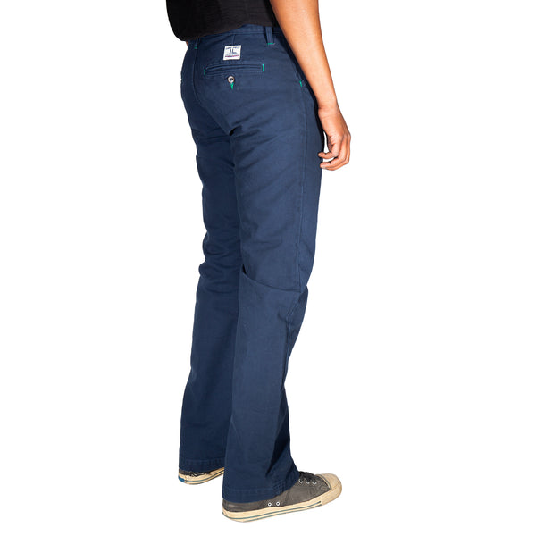 Navy blue pants worn by a person on a white background