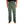 Person wearing green pants on a white background