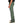 Green pants worn by a person on a white background