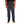 Dark gray pants worn by a person on a white background