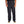 Black pants worn by a person on a white background