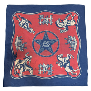 A red and blue bandana with a rotary print featuring horses cowboy and the brand 'Left Field'.