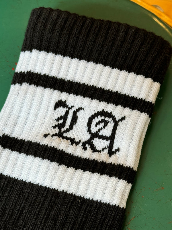 LA for Los Angeles black and white socks