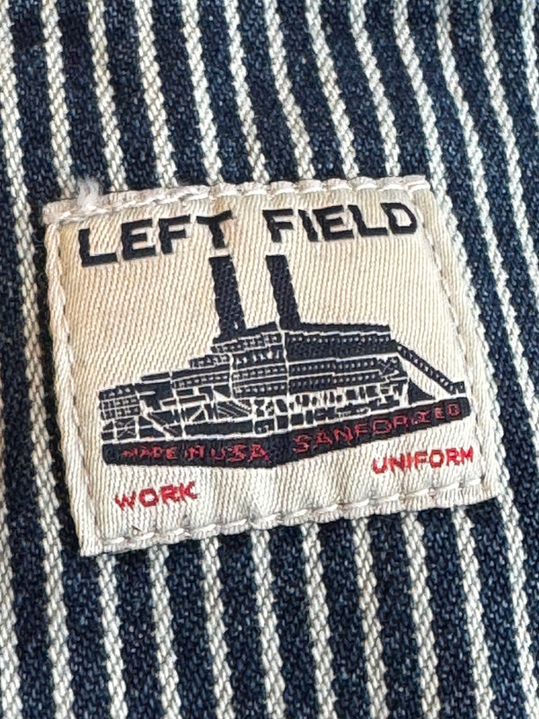 Label on a striped fabric with text and graphics