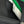 Close-up of a green lining and button detail.