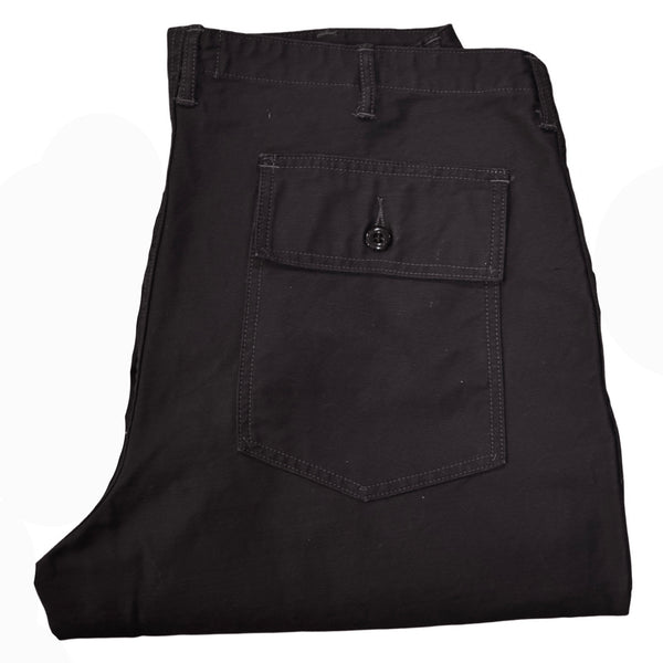 A pair of black chino trousers with front and back patch pockets