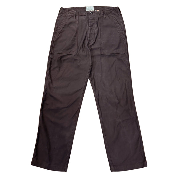 A pair of faded slate gray/black chinos with front and back patch pockets, high-rise waist, and long button front fly.