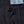 A pair of black chino trousers with front and back patch pockets