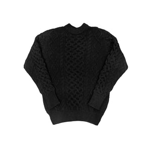 Black sweater with a textured pattern on a white background