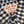 Close-up of a blue and white checkered shirt with a 'Left Field Sportswear New York City' label.