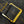 Gold metal buckle on black denim fabric