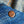 A pair of natural indigo dyed denim jeans with visible texture and a classic design.