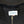 Close-up of a black sweatshirt with a Left Field label on the collar.