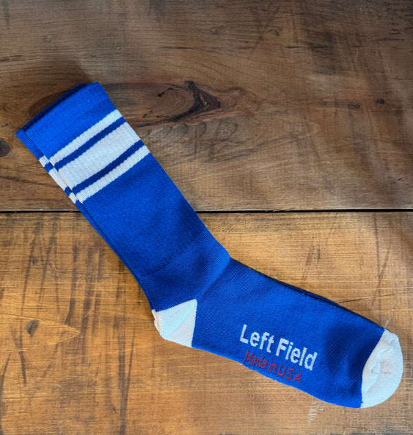 blue and white striped bamboo tube socks with the brand label 'Left Field NYC' displayed at the top.