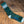  pair of green and white striped bamboo tube socks with the brand label 'Left Field NYC' displayed at the top.