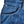 A pair of folded blue denim jeans with a label visible on the waistband.