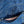A pair of folded blue denim jeans