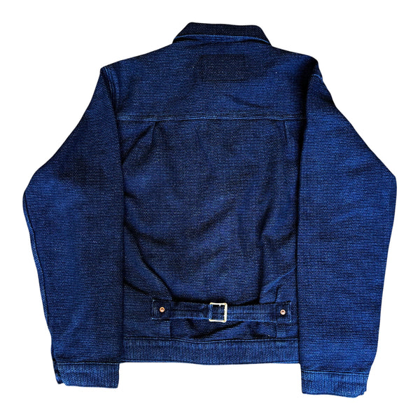 Blue denim jacket on a white background