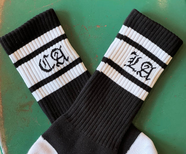 LA for Los Angeles and Ca for California black and white socks