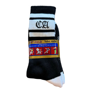 A pair of black and white striped bamboo tube socks with the branding 'CA' on the ankle area, displayed on a white background.