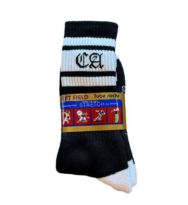 A pair of black and white striped bamboo tube socks with the branding 'CA' on the ankle area, displayed on a white background.