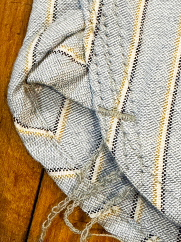 Textured fabric with a wooden surface underneath