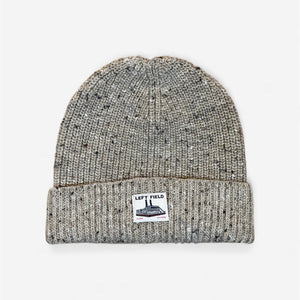 Gray knit beanie with a brand label on a white background
