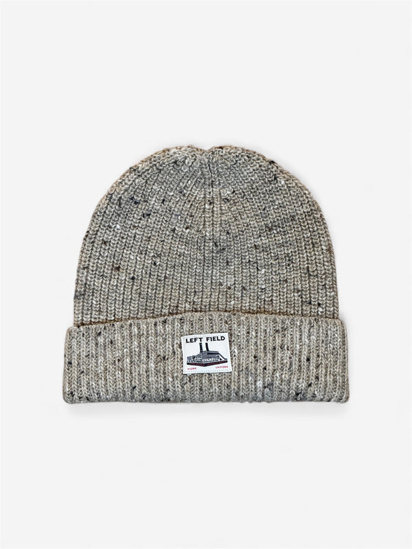 Gray knit beanie with a brand label on a white background