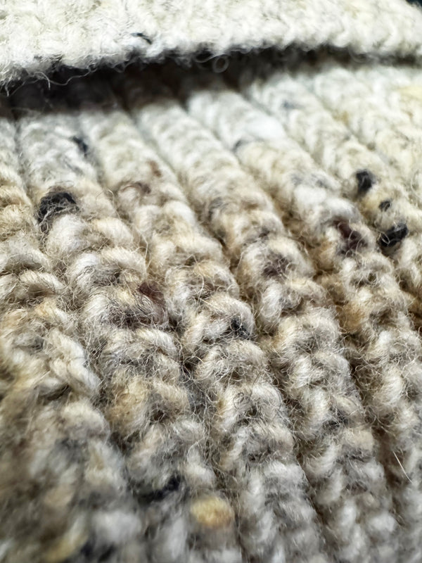 Close-up of textured beige carpet