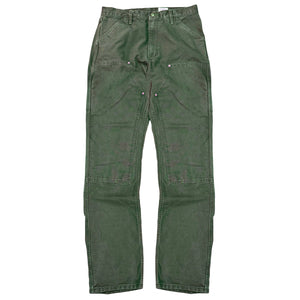 A pair of olive green vintage washed double knee work uniform chinos with pockets and rivets.