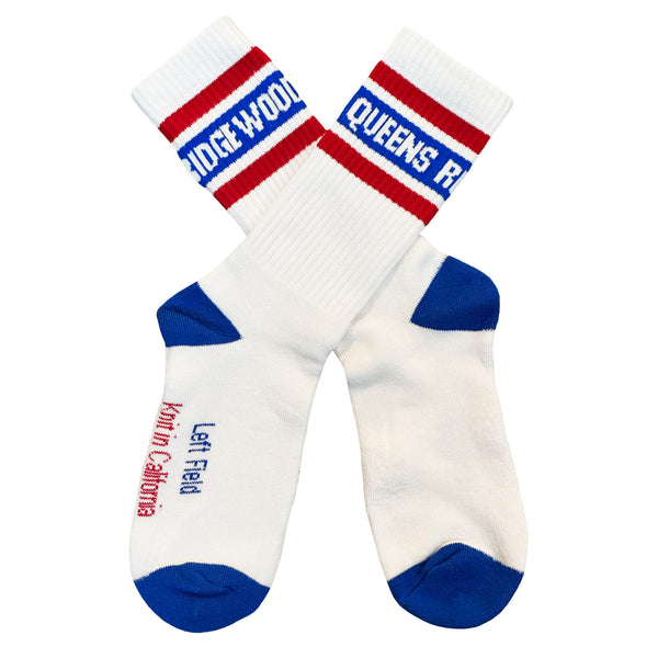 Pair of socks with 'Queens' text and blue accents on a white background
