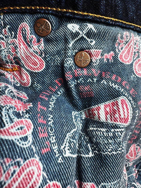 Close-up of denim fabric with brand logo and text