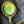 Close-up of a button with a green design on dark fabric